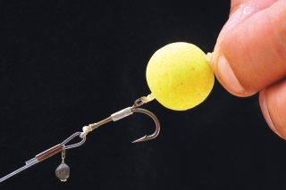 Boilies zaistíme zarážkou.
