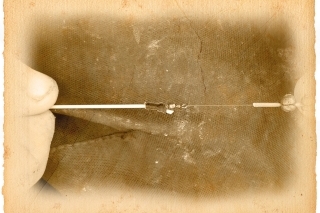 Ukončeni amortizéra pomocou bužírky natiahnutej na obratlík.